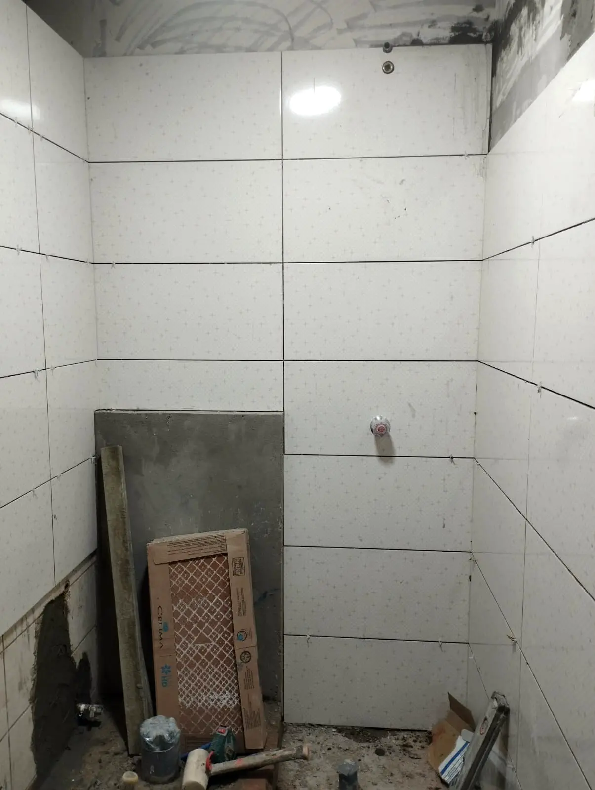 Enchape de zona de ducha con azulejo